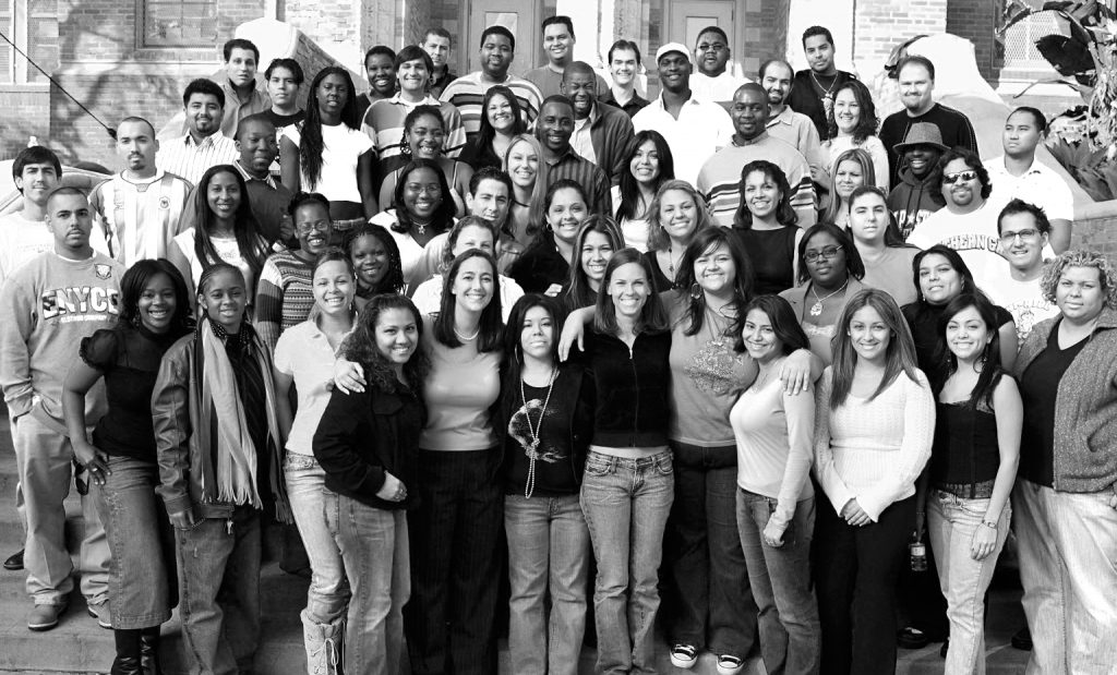 A black and white photo of Erin Gruwell and several Freedom Writers.