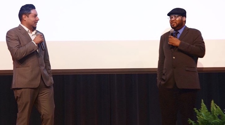 Original Freedom Writers Tony and Narada present onstage to students.